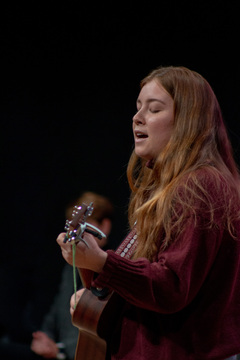 Remembrance Scholar Emma Dahmen performs “Make You Feel My Love” by Adele. Dahmen was the first scholar of the night to share her musical talents with the audience. 
