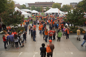 Members of the Syracuse community convene on the quad before heading to the Carrier Dome for the Orange's Atlantic Coast Conference debut.