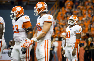 Quarterback Tajh Boyd smiles as Clemson routs Syracuse in the Orange's Atlantic Coast Conference debut.