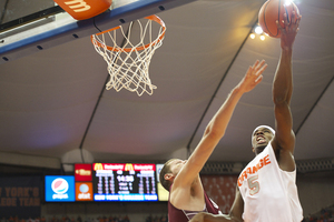 C.J. Fair goes up for a layup in Syracuse's 69-50 win against Colgate on Saturday. Fair scored a game-high 20 points, including a momentum-shifting 3-pointer during the Orange's 15-0 first-half run.