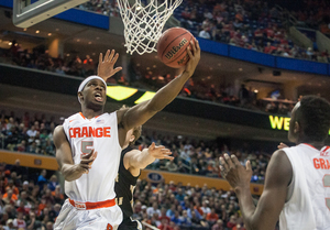 C.J. Fair elevates for a reverse layup in the first half of Syracuse's 77-53 win over Western Michigan on Thursday. Fair finished with 14 points on 6-of-13 shooting to go with a team-high 11 rebounds.