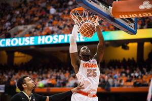 Rakeem Christmas throws down a two-handed dunk in the first half of Tuesday's game. His 35 points led Syracuse to a gritty overtime win against Wake Forest.