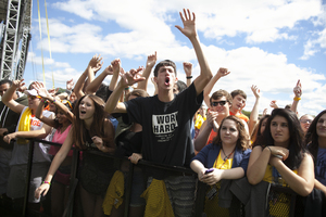 Mark Gschwind, a senior in the College of Engineering and Computer Science, enjoys Smallpools' set surrounded by other students at Juice Jam in 2013.