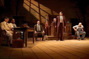 From left: Mark Murphey (Atticus Finch), Landon G. Woodson (Tom), Liam Craig (Heck Tate), Christopher McHale (Judge Taylor), John Keabler (Mr. Gilmer), and John Pribyl (Bob Ewell) in the Syracuse Stage production of 