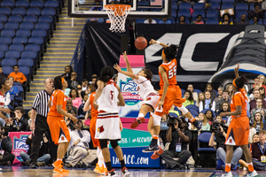 Bria Day blocks a shot during Syracuse's 80-75 win over Louisville. SU dominated UofL in the paint, a change of pace from the teams' regular season matchup. 