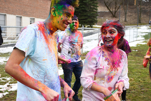 Prabhanjan Balakrishnan (left) and Khadija Isfahan take part in SASA’s festival of colors celebration.