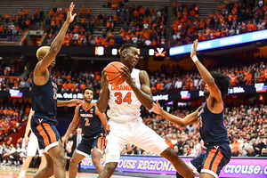 Bourama Sidibe and the Syracuse forwards go up against an Oklahoma State team that scores most of its points inside the arc.