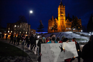 After the speeches, about 30-40 attendees went outside and marched around campus with signs displaying phrases to raise awareness about domestic abuse.