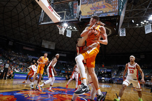 Dalton’s Knecht provided a scoring spark for No. 7 Tennessee while Naheem McLeod's rebounding proved to be an issue in its first game at the Allstate Maui Invitational. 