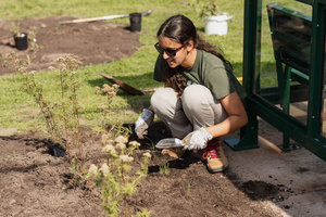 Mini Meadows members lay new soil and meadow mix at different parks in the area. They hope the greenery will signify change, encouraging locals to educate themselves on native plants and pollutants. 