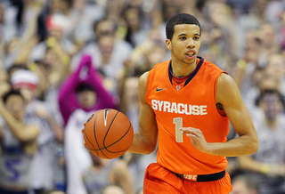 Michael Carter-Williams brings the ball up the court.