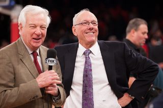 Jim Boeheim grins during a post game interview with Bill Raftery on the court in Madison Square Garden. 