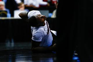 Rozier grimaces after finishing a coast-to-coast layup and taking contact, drawing a foul in the process.