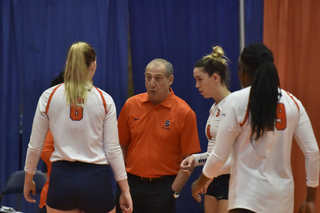 Leonid Yelin talks to his players during the game.