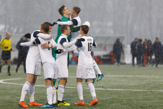 Akron celebrates following a goal.