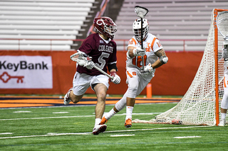 Tyson Bomberry defends a Colgate player. 