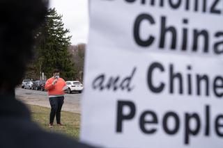 The rally consisted of a series of speakers and chants led by organizers.