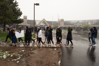 The women's cross country team marches past Goldstein Student Center as part of the Black Athletes Lives Matter march organized by the Diversity and Inclusion Student-Athlete Board and the Student-Athlete Advisory Committee.