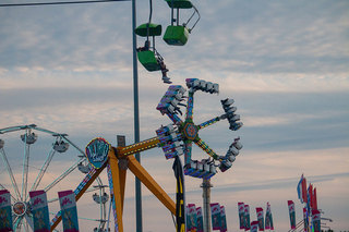 Fairgoers ride the Claw, a popular ride featured at the New York State Fair. 