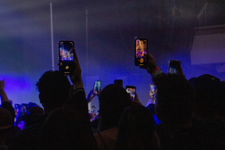 Pi’erre Bourne takes the stage and students bring out their phones to record the headlining act. 