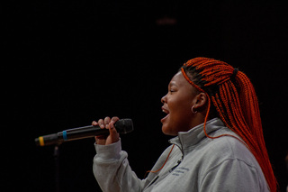 Remembrance Scholar Ofentse Mokoka took the lead on a traditional South African song, “Indodana.” Mokoka explained to the audience the meaning behind the song and how it is “tragically beautiful.” 